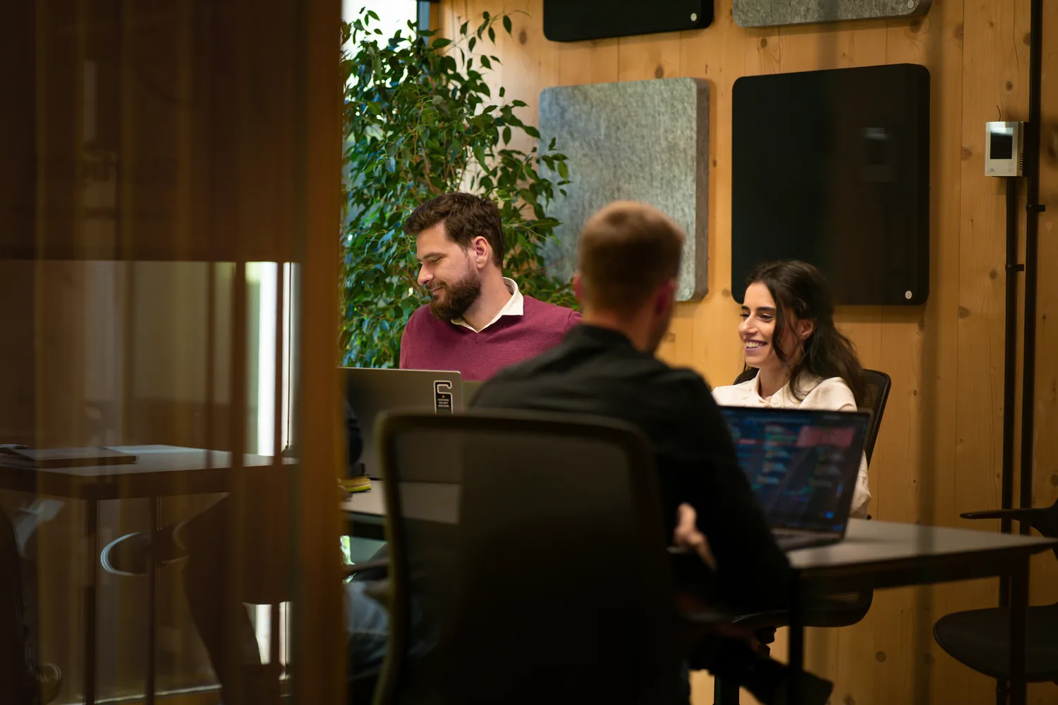A small team working together, talking through the work