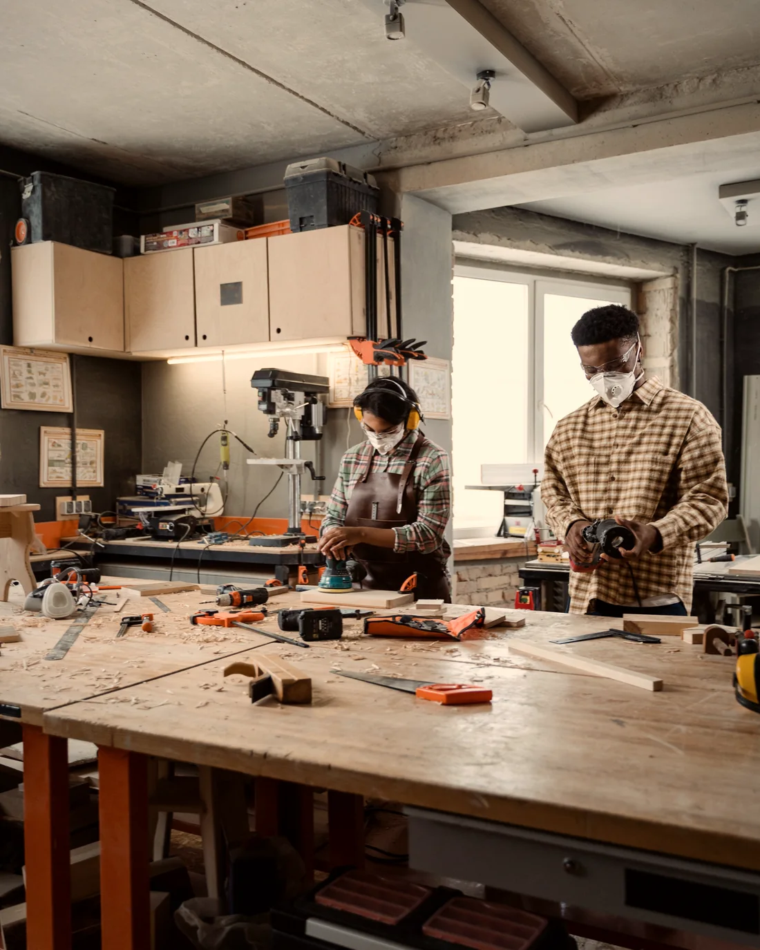 A small team building together in a workshop